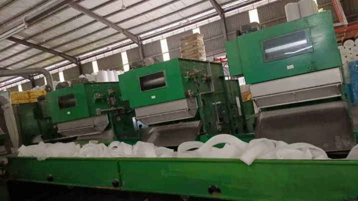 Fiber opening machines separating compressed bales